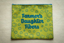 Load image into Gallery viewer, Yellow pouch with floral pattern and &#39;Farmer&#39;s Daughter Fibers&#39; text on a beige surface