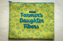 Load image into Gallery viewer, Yellow fabric pouch with floral patterns and &#39;Farmer&#39;s Daughter Fibers&#39; text on a light wooden surface.
