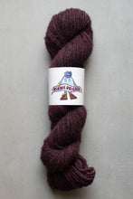 Load image into Gallery viewer, Purple skein of yarn with a label on a gray background