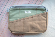 Load image into Gallery viewer, Two-tone pouch with 'Soolala' branding on a textured surface
