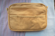 Load image into Gallery viewer, Beige pouch on a textured surface