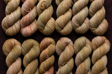 Load image into Gallery viewer, gold row of yarn hanks