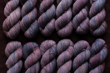 Load image into Gallery viewer, purple row of yarn hanks