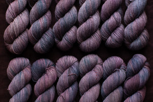 purple row of yarn hanks