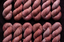 Load image into Gallery viewer, pink row of yarn hanks