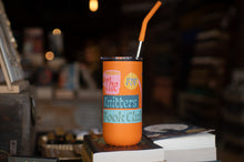 Load image into Gallery viewer, Orange tumbler with a straw on top of books in a blurred indoor setting