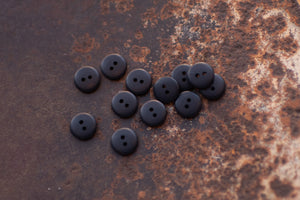 black flat buttons