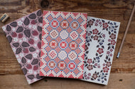 set of designer notebooks