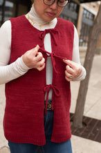 Load image into Gallery viewer, Person wearing a red vest with a white shirt and glasses, standing outdoors.