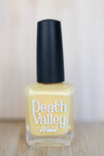 Load image into Gallery viewer, Nail polish bottle labeled &#39;Death Valley&#39; on a wooden surface with a neutral background