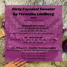 Load image into Gallery viewer, Purple label with text about &#39;Dirty Caramel Sweater&#39; by Veronika Lindberg on a textured fabric background.