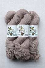 Load image into Gallery viewer, Three skeins of Pishkun brand yarn in a dusty taupe-brown color, arranged side-by-side on a light gray textured fabric background.