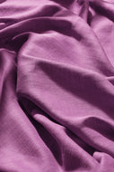 Close-up of purple fabric with folds