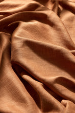 Load image into Gallery viewer, Close-up of brown fabric with folds