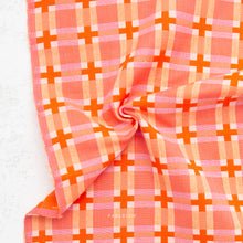 Load image into Gallery viewer, Pink and orange checkered fabric on a white background