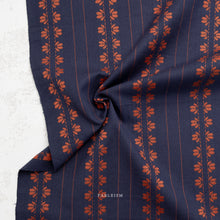 Load image into Gallery viewer, Navy fabric with red floral pattern on a white background