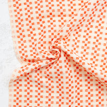 Load image into Gallery viewer, Close-up of orange and white checkered fabric