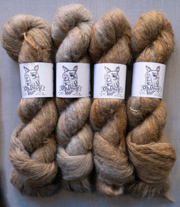 four brown yarn hanks