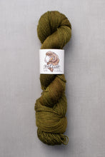 Load image into Gallery viewer, Green skein of yarn with a label on a gray background