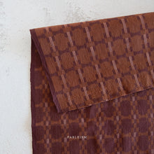 Load image into Gallery viewer, Brown patterned fabric with 'Fableism' branding on a light gray background