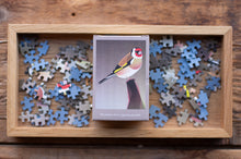 Load image into Gallery viewer, Jigsaw puzzle with a bird design on a wooden tray