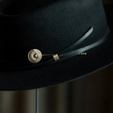 Load image into Gallery viewer, Black hat with a decorative band featuring a gold buckle and turquoise stone.