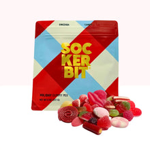 Load image into Gallery viewer, Sockerbit holiday gummy mix packaging with colorful geometric design on a white background