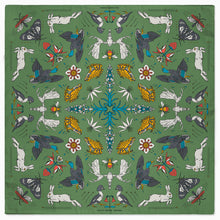 Load image into Gallery viewer, Decorative green fabric with animal and floral pattern on a white background