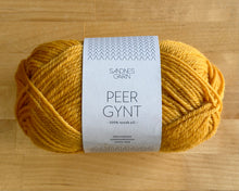 Load image into Gallery viewer, Yellow yarn skein with a label on a wooden surface