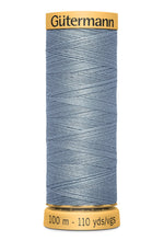 Load image into Gallery viewer, Spool of Gutermann thread with a blue color on a white background