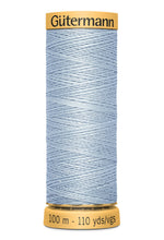 Load image into Gallery viewer, Spool of Gutermann thread with a light blue color on a white background