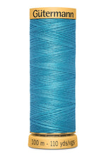 Load image into Gallery viewer, Blue spool of Gutermann thread on a white background