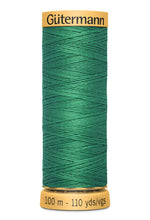 Load image into Gallery viewer, Spool of green thread with 'Gäutermann' branding on a white background