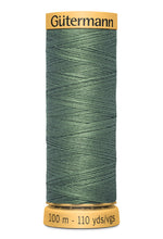 Load image into Gallery viewer, Spool of Gutermann thread on a white background