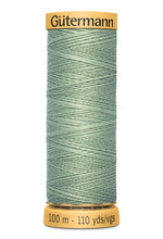 Load image into Gallery viewer, Spool of Gutermann thread on a white background