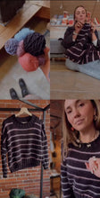 Load image into Gallery viewer, A four-panel collage showing a striped knit sweater in different contexts: a hand holding balls of yarn, the sweater worn by a seated woman, the sweater hanging on a rack against a brick wall, and a close-up of a woman wearing the sweater.