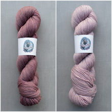 Load image into Gallery viewer, Two skeins of pink yarn with labels on a gray background