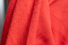 Load image into Gallery viewer, Close-up of red textured fabric