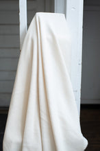 Load image into Gallery viewer, White textured fabric draped over a white ladder against a neutral background