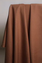 Load image into Gallery viewer, Brown fabric draped over a surface with a neutral background