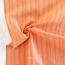Load image into Gallery viewer, Close-up of orange fabric with yellow stripes on a white background