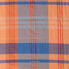 Load image into Gallery viewer, Plaid fabric with orange, blue, and gray colors featuring the brand 'Fableism'.