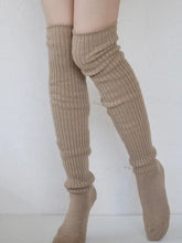Load image into Gallery viewer, Beige ribbed knee-high socks on a plain background