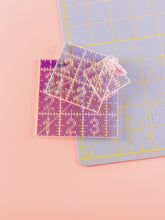Load image into Gallery viewer, Transparent ruler with numbers on a pink and purple grid background