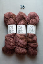 Load image into Gallery viewer, Three skeins of fluffy yarn in a dusty mauve-brown colorway, arranged side by side on a light gray background with a small blue '16' printed above them. Each skein has a white paper label featuring a dog illustration and the text 'The Dog Store'.