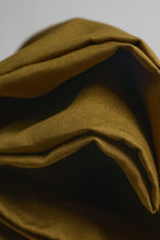 Load image into Gallery viewer, Close-up of folded mustard yellow fabric