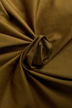 Load image into Gallery viewer, Close-up of brown fabric with folds