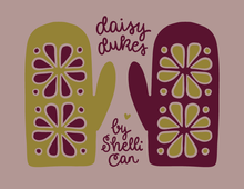 Load image into Gallery viewer, A graphic design featuring two mitten shapes with floral cutout patterns, one in olive green and one in dark burgundy, on a dusty mauve background with the text 'daisy dukes by Shelli Can'.