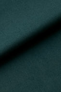 Teal fabric texture with a diagonal shadow