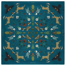 Load image into Gallery viewer, Decorative blanket with nature-themed pattern on a blue background